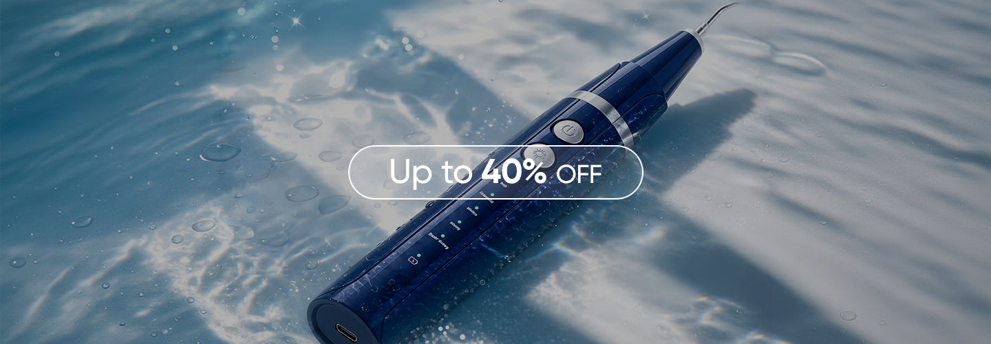 waterproof electric dental plaque remover submerged in water