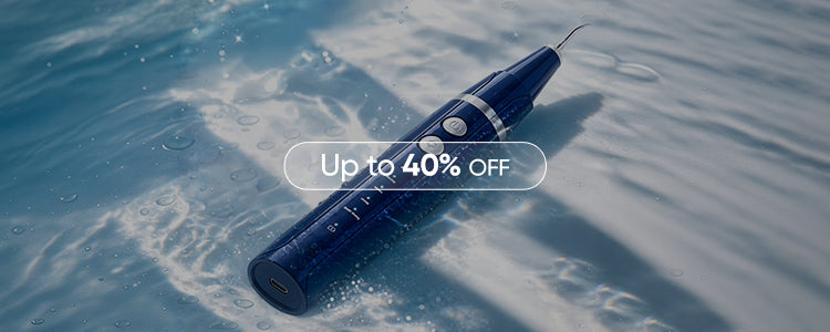 waterproof electric dental plaque remover submerged in water