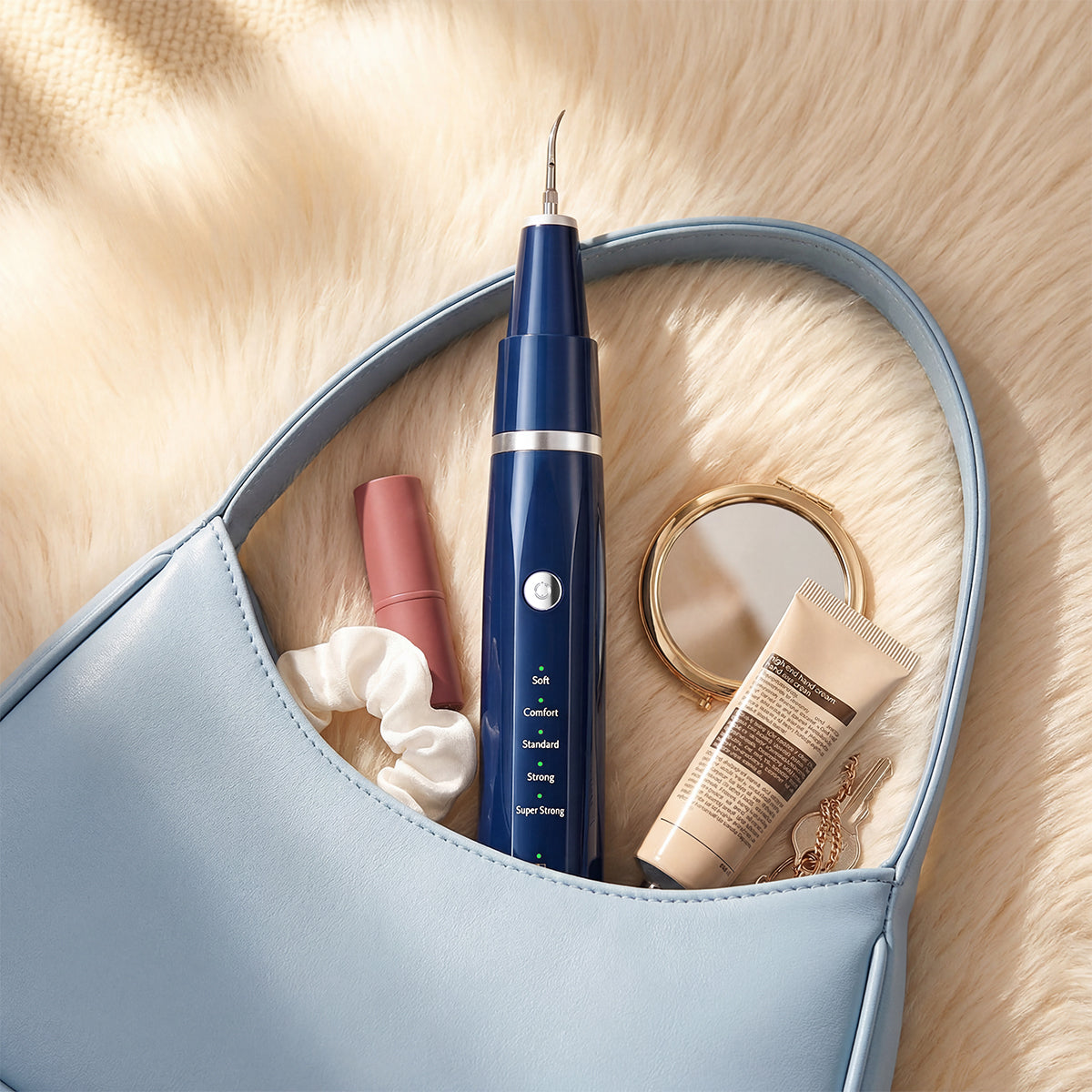 Vtiisamao portable electric plaque remover in handbag – cordless teeth cleaning tool for travel and on-the-go use
